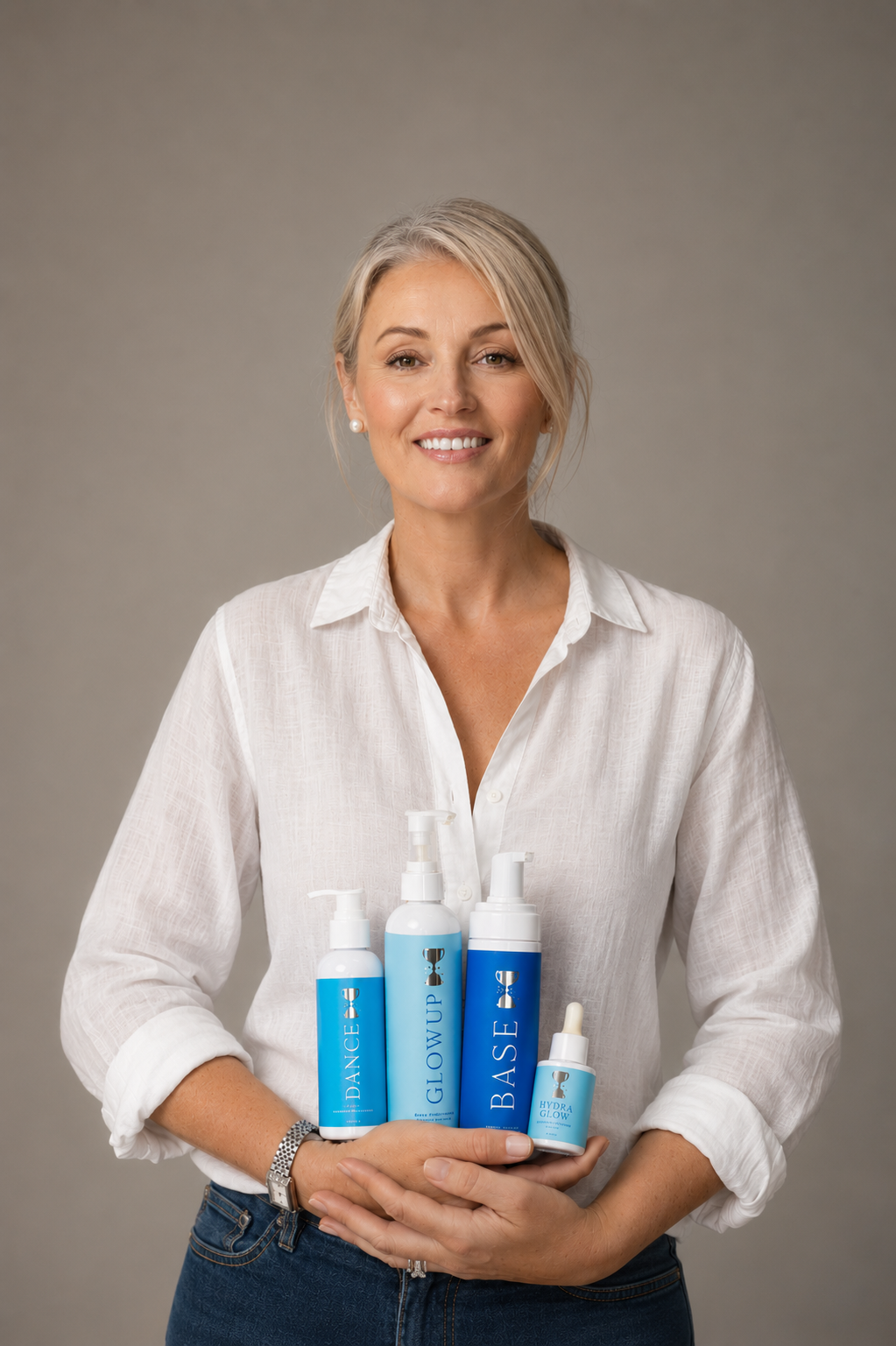 Bree holding Championship Tan products 